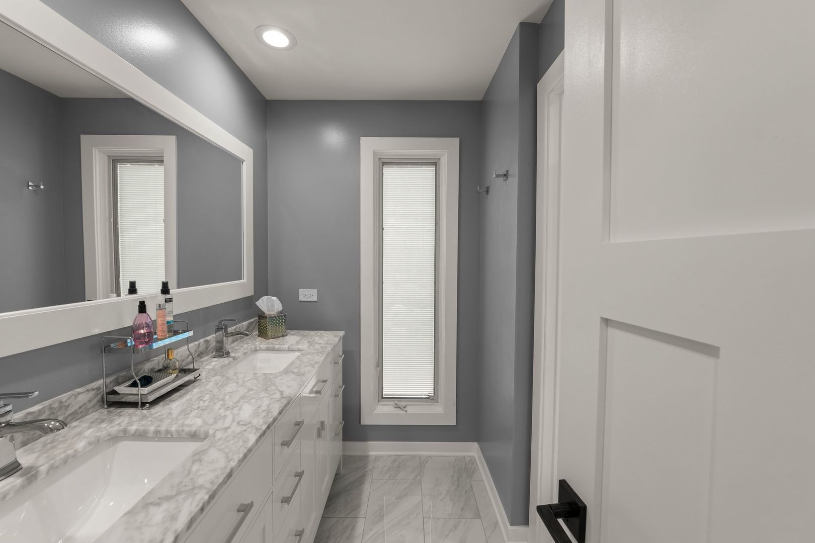 620 West Old Elm Road Lake Forest, IL 60045 - Photo 39 of 77 a bathroom with a granite countertop sink and a mirror