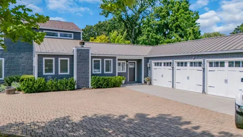 a car parked in front of a house