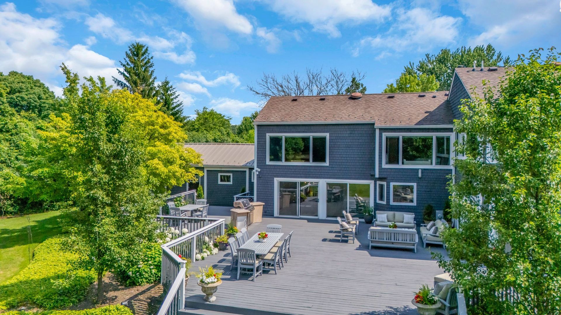 620 West Old Elm Road Lake Forest, IL 60045 - Photo 69 of 77 a view of a patio with table and chairs and potted plants