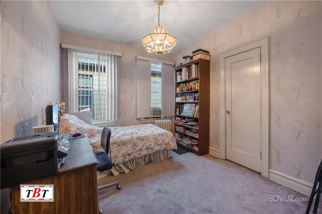 907 Ave. M Brooklyn, NY 11230 - Photo 15 of 22 a bedroom with bed and a window
