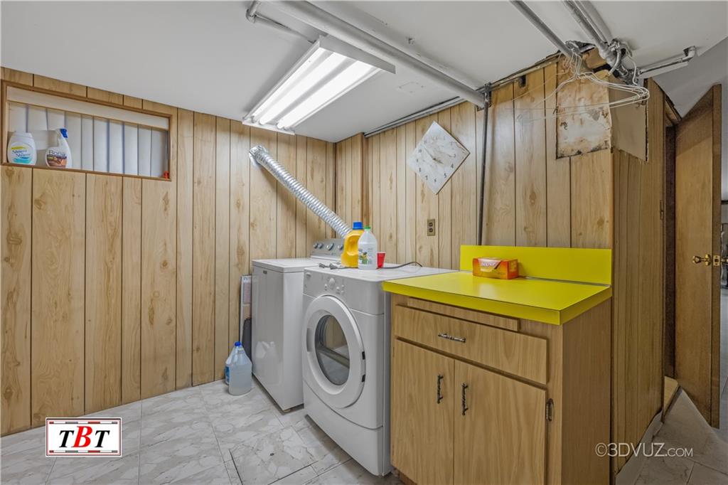 907 Ave. M Brooklyn, NY 11230 - Photo 22 of 22 a utility room with dryer and washer