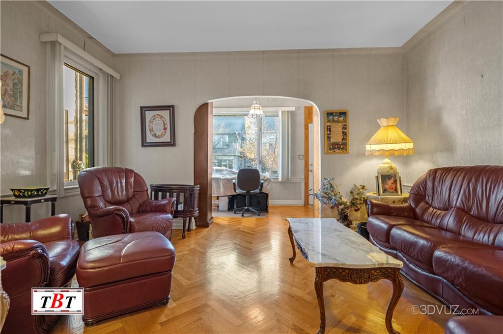 907 Ave. M Brooklyn, NY 11230 - Photo 3 of 22 a living room with furniture and a lamp