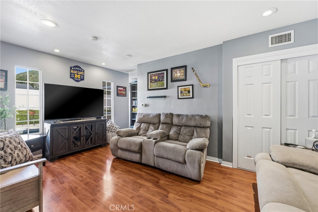 3465 Conata Street Duarte, CA 91010 - Photo 16 of 36 a living room with furniture and a flat screen tv