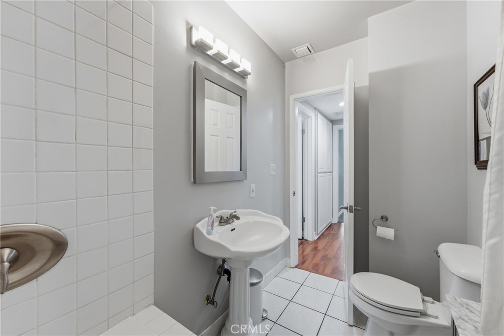 3465 Conata Street Duarte, CA 91010 - Photo 18 of 36 a bathroom with a sink toilet and shower