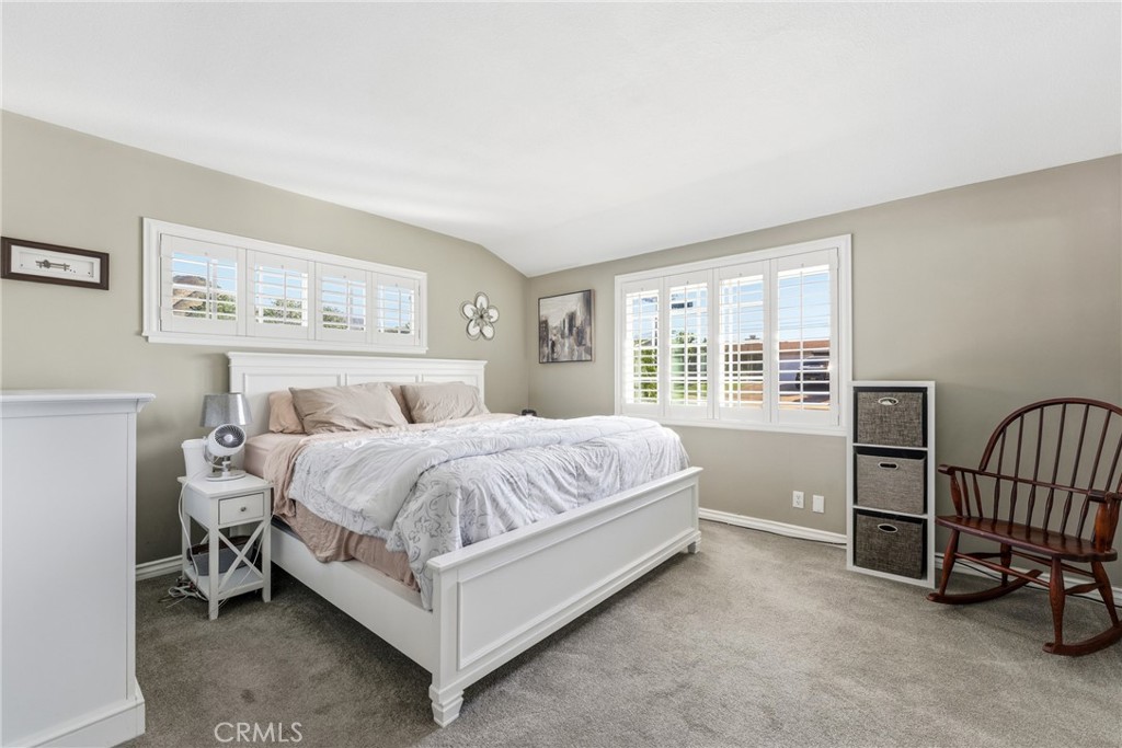 3465 Conata Street Duarte, CA 91010 - Photo 27 of 36 a spacious bedroom with a bed and a window