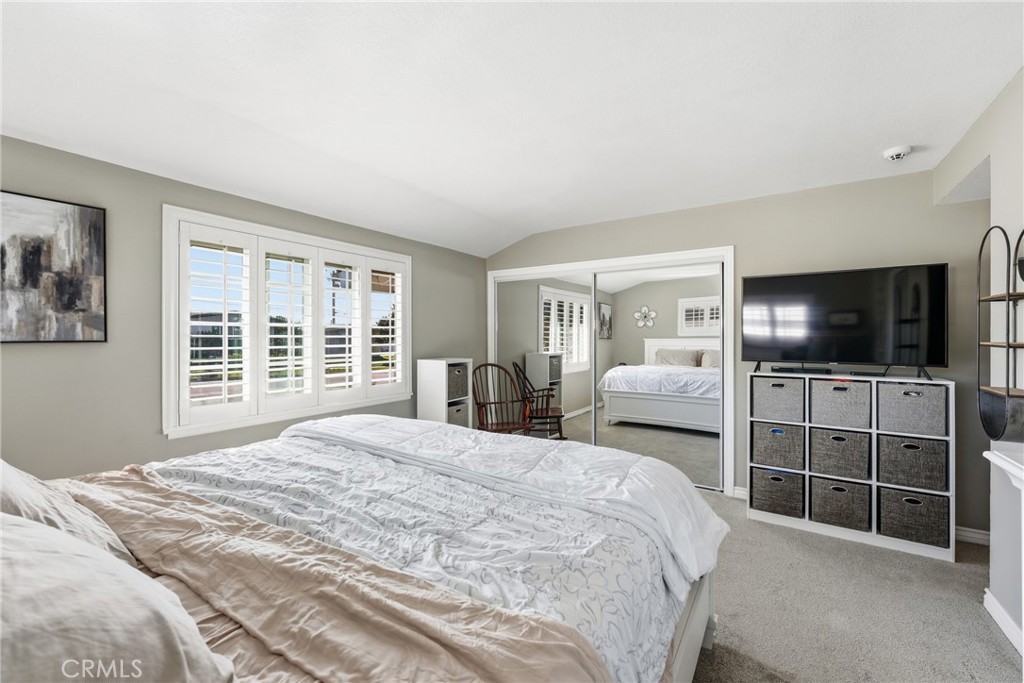 3465 Conata Street Duarte, CA 91010 - Photo 29 of 36 a bedroom with a large bed and a flat screen tv