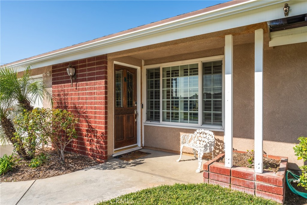 3465 Conata Street Duarte, CA 91010 - Photo 3 of 36 a chair and table in front of a house