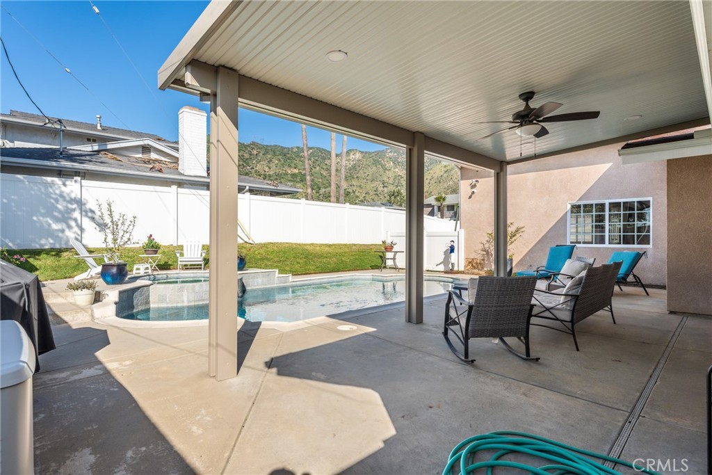 3465 Conata Street Duarte, CA 91010 - Photo 33 of 36 a living room with furniture and a floor to ceiling window