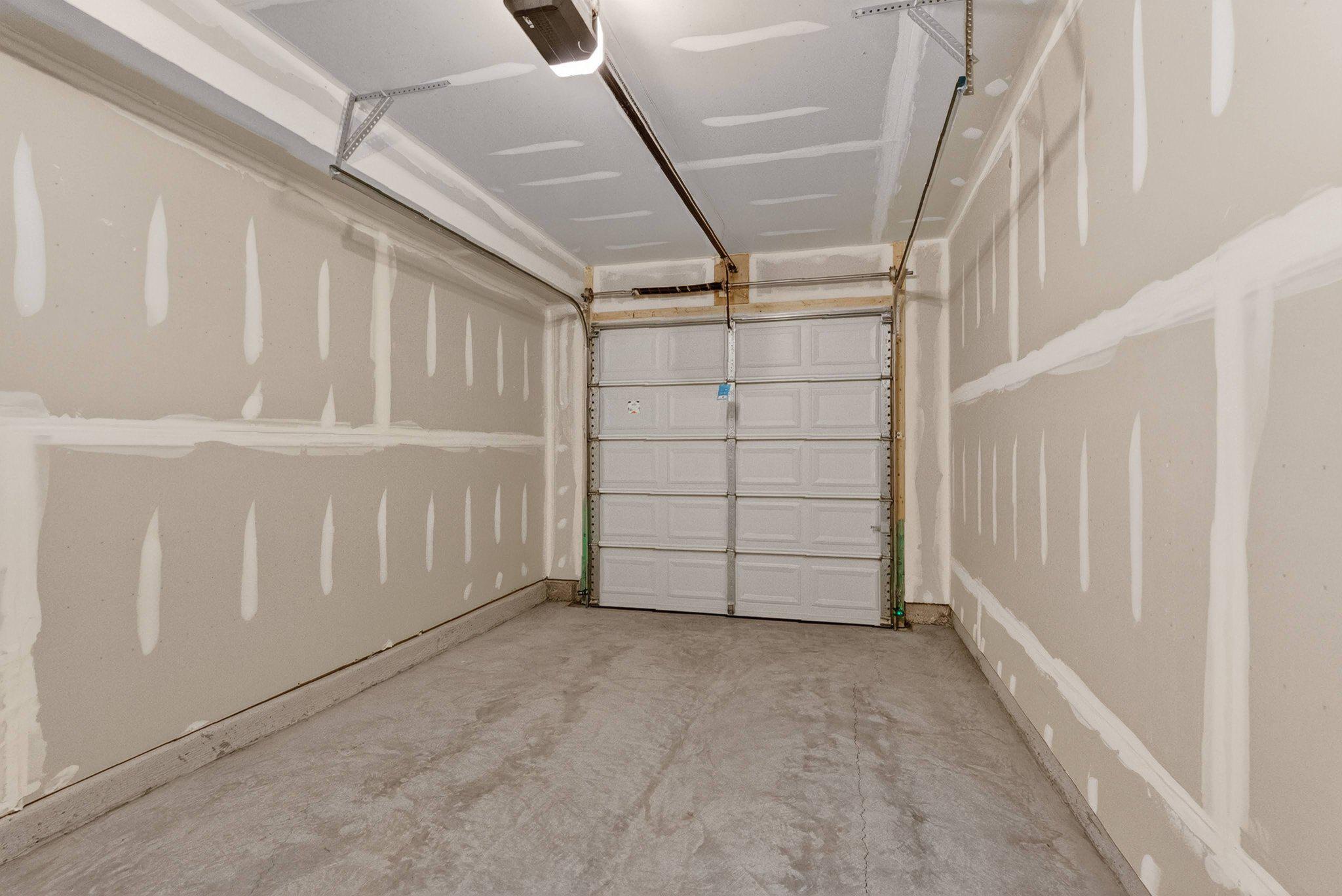 109 Gelding Way Stephenson, VA 22656 - Photo 24 of 28 Spacious garage ready for your vision.