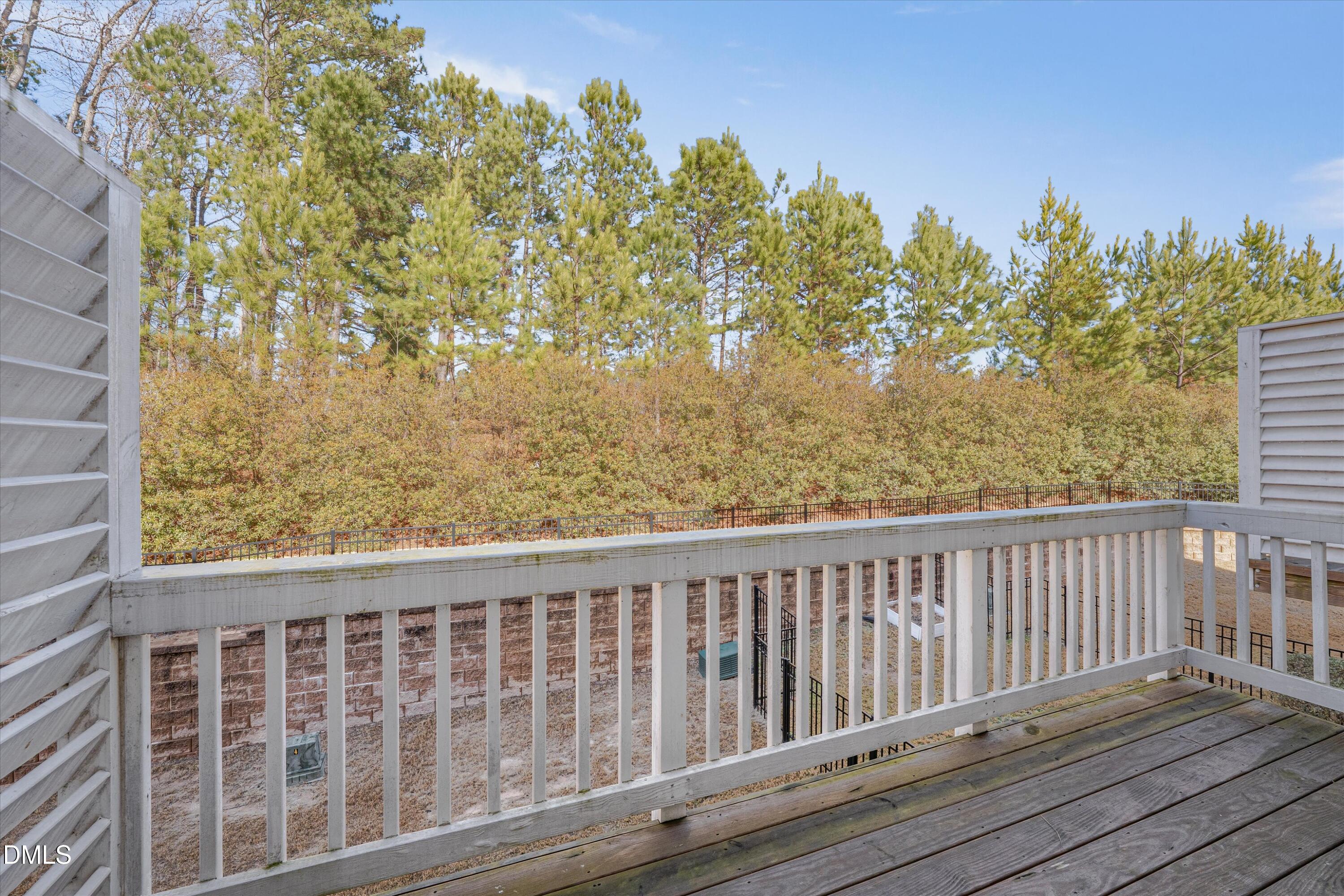 2819 Dallas Valley Lane Apex, NC 27502 - Photo 19 of 38 a view of wooden balcony with outdoor space