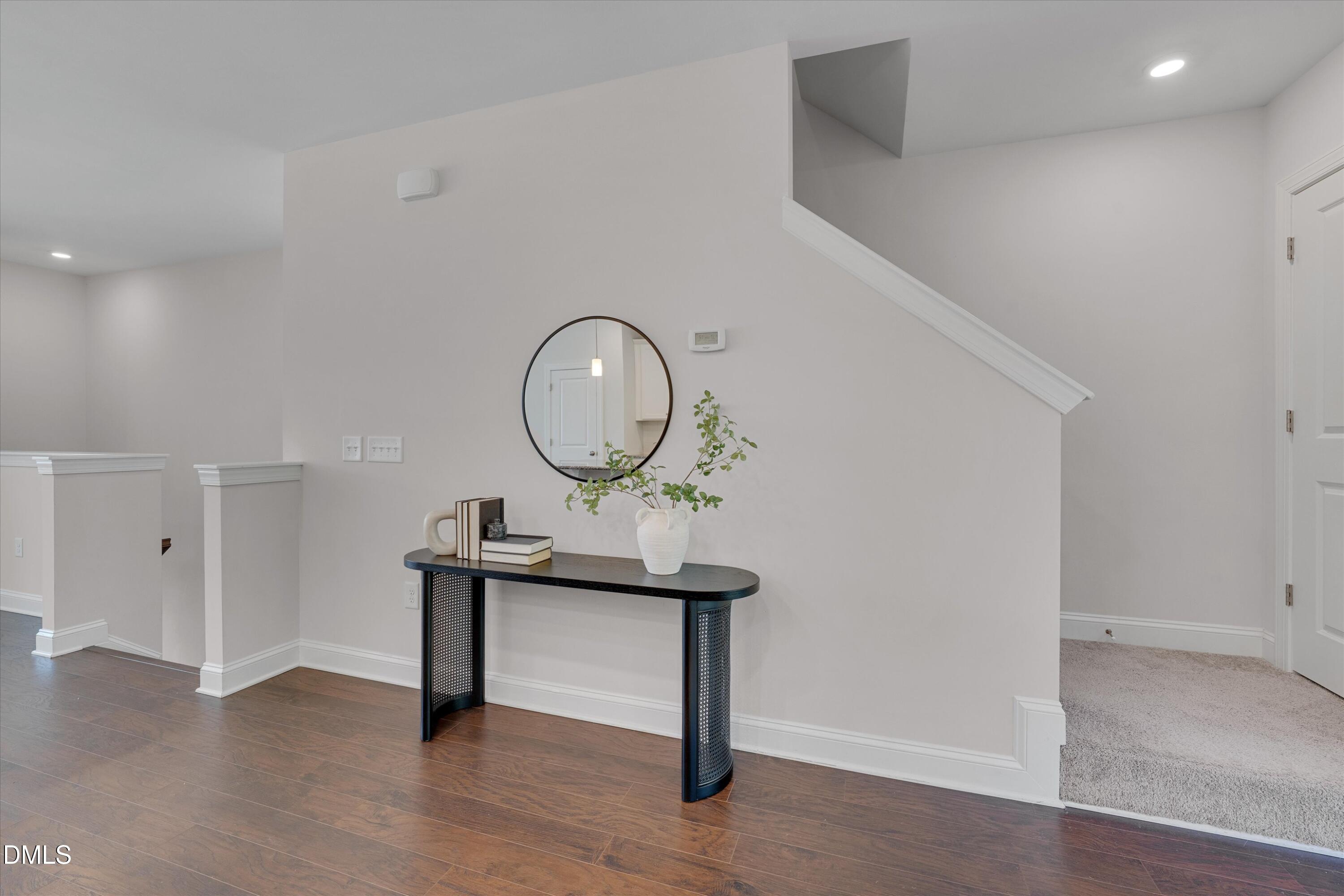 2819 Dallas Valley Lane Apex, NC 27502 - Photo 20 of 38 a view of a room with wooden floor and wooden floor