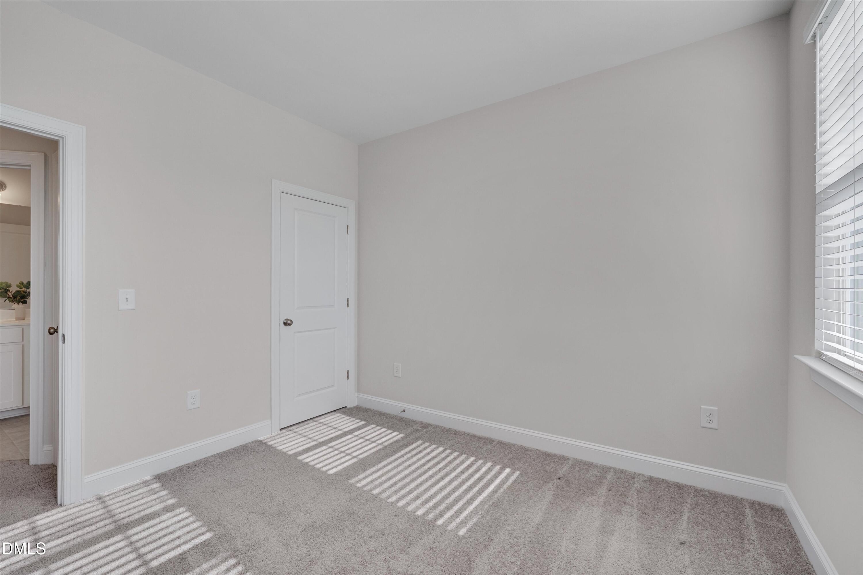 2819 Dallas Valley Lane Apex, NC 27502 - Photo 30 of 38 an empty room with a window