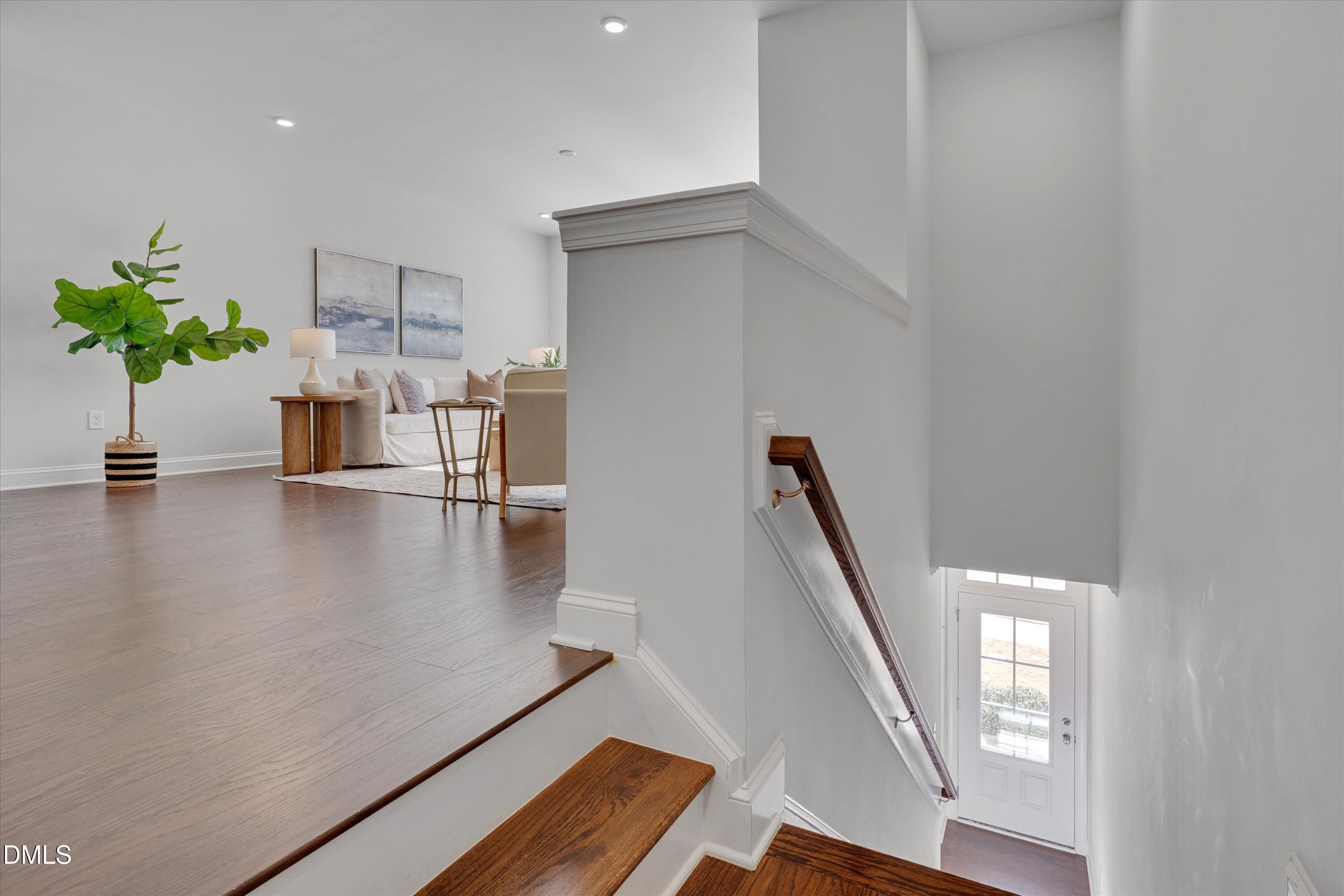 2819 Dallas Valley Lane Apex, NC 27502 - Photo 3 of 38 a view of a living room and hardwood floor