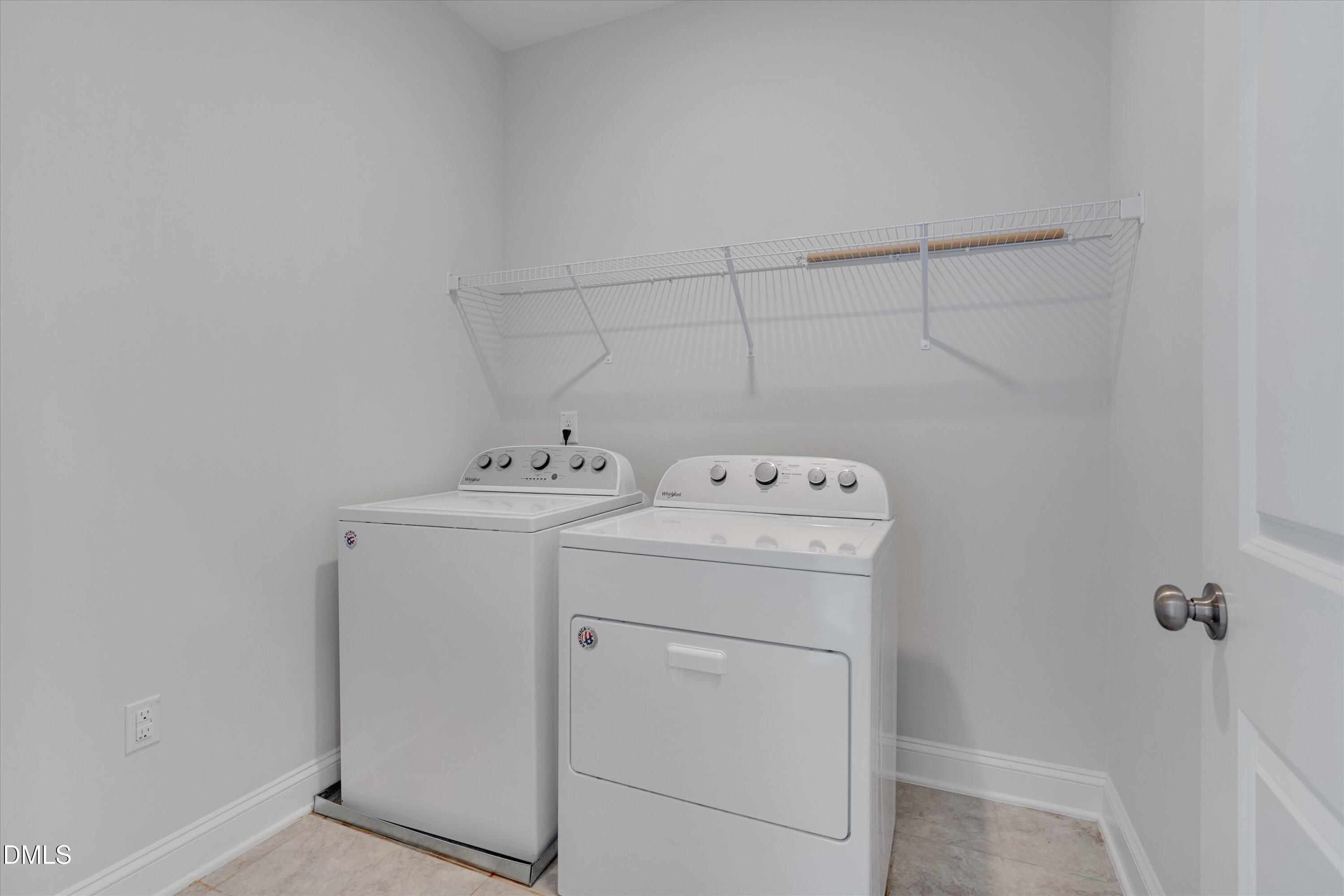 2819 Dallas Valley Lane Apex, NC 27502 - Photo 31 of 38 a utility room with dryer and washer
