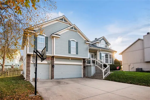 $410,000 | 2421 Northeast Carousel Court, Lee's Summit, MO 64086