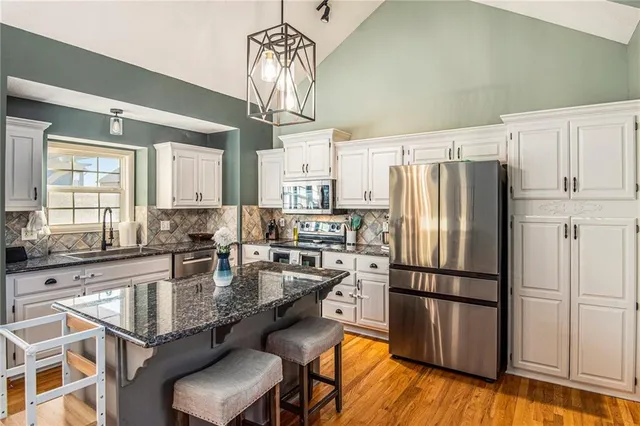 $410,000 | 2421 Northeast Carousel Court, Lee's Summit, MO 64086