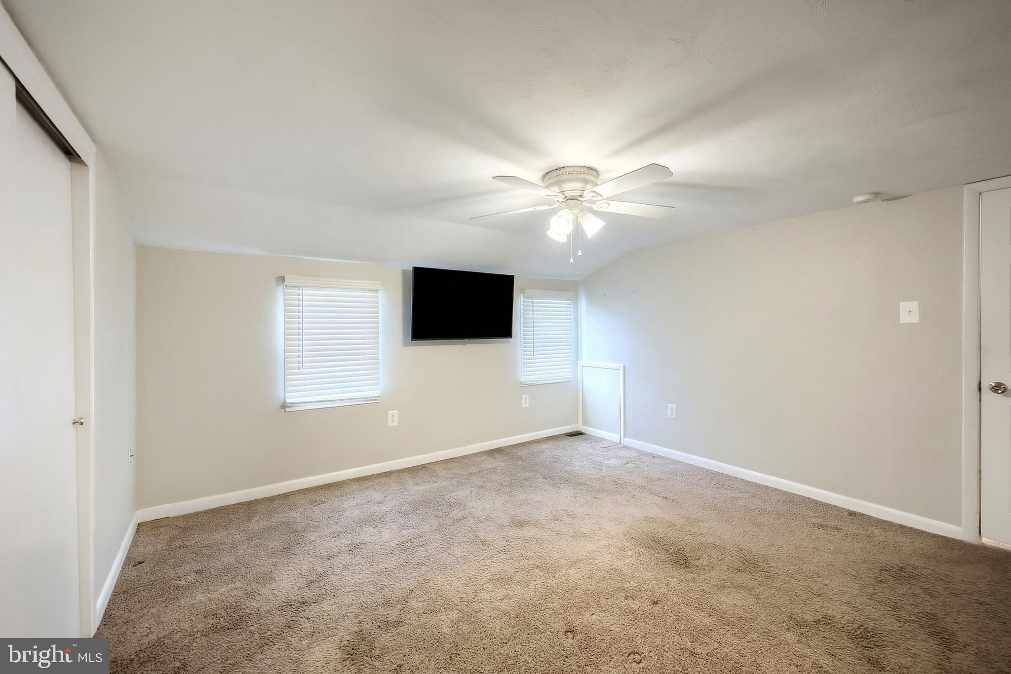 1455 Felton Road Felton, PA 17322 - Photo 21 of 35 an empty room with windows and fan