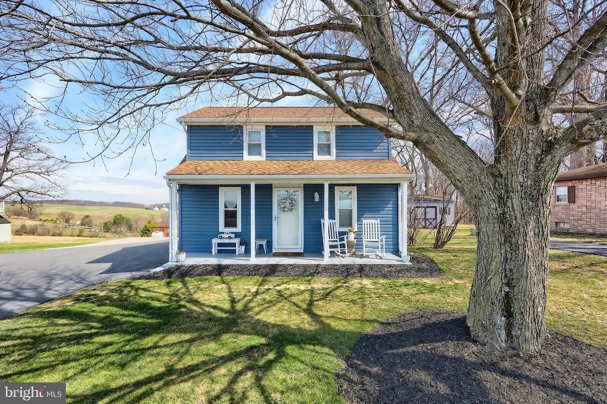 1455 Felton Road Felton, PA 17322 - Photo 3 of 35 a view of house with a yard outdoor seating and large tree