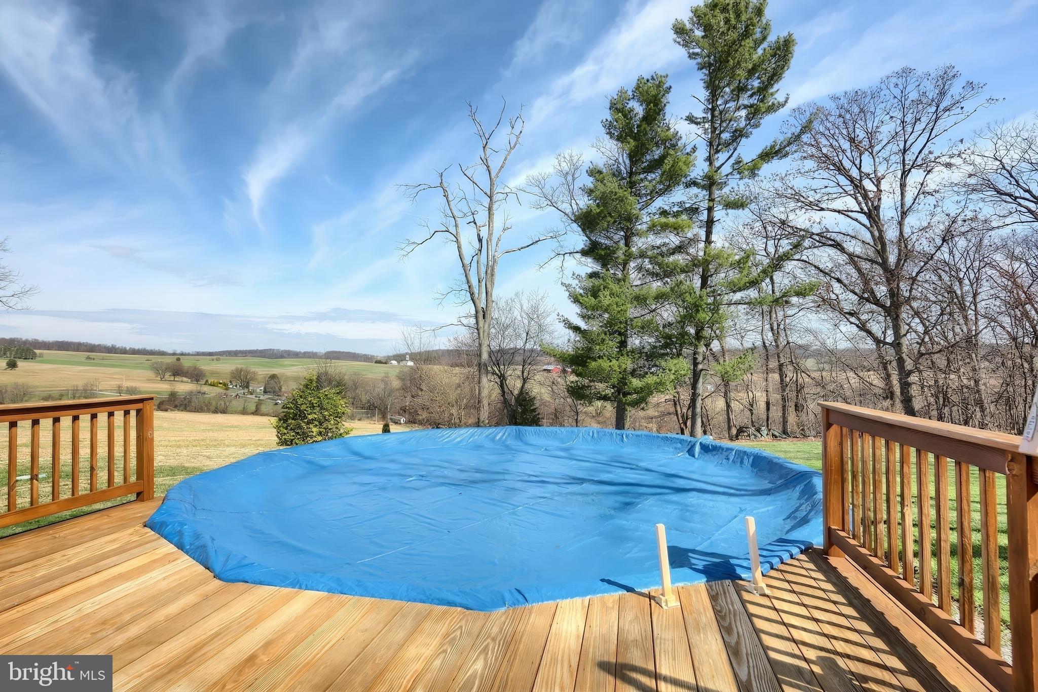 1455 Felton Road Felton, PA 17322 - Photo 5 of 35 a view of balcony with wooden floor and fence