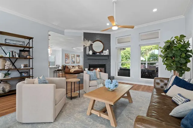 a kitchen with a stove a sink and cabinets