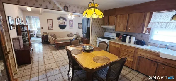 a bathroom with a sink a toilet and a bathtub