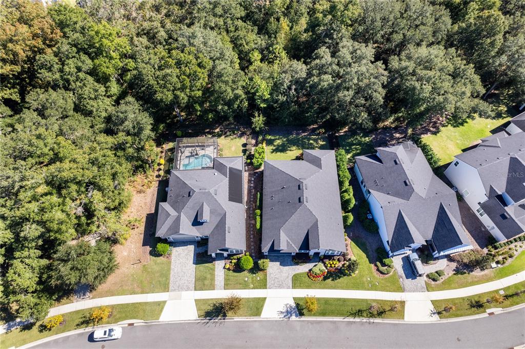11075 Southwest 38th Boulevard Gainesville, FL 32608 - Photo 26 of 37 an aerial view of multiple houses with yard