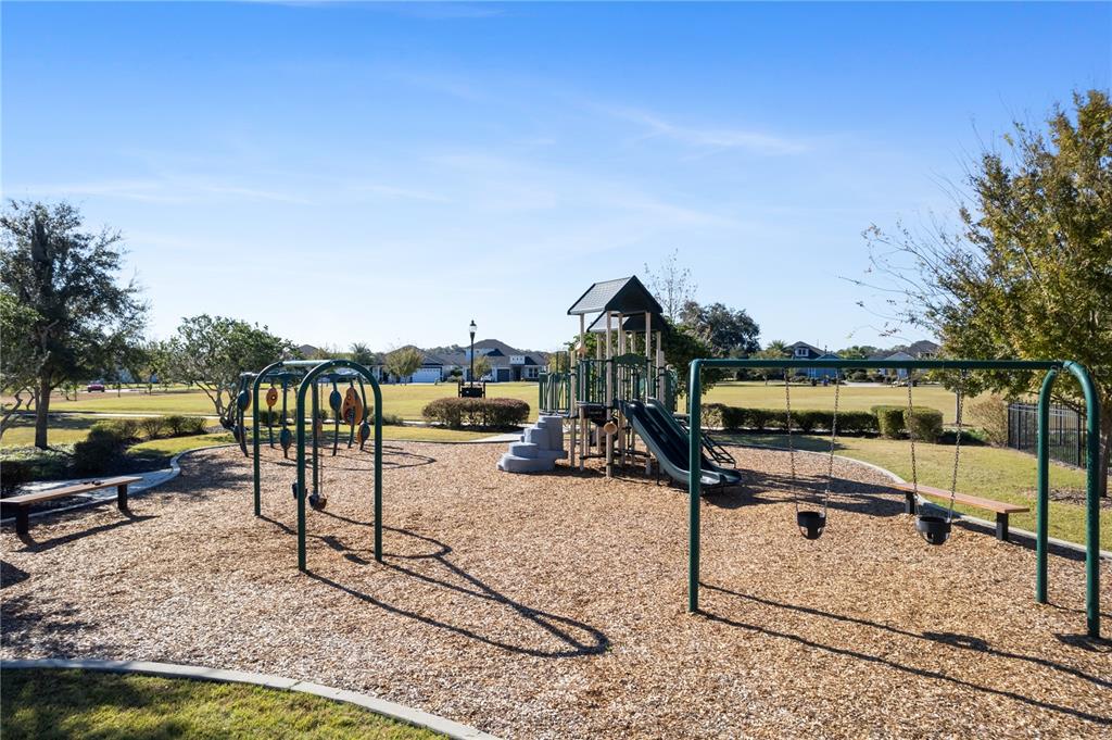 11075 Southwest 38th Boulevard Gainesville, FL 32608 - Photo 36 of 37 a view of a swimming pool with a patio and a garden