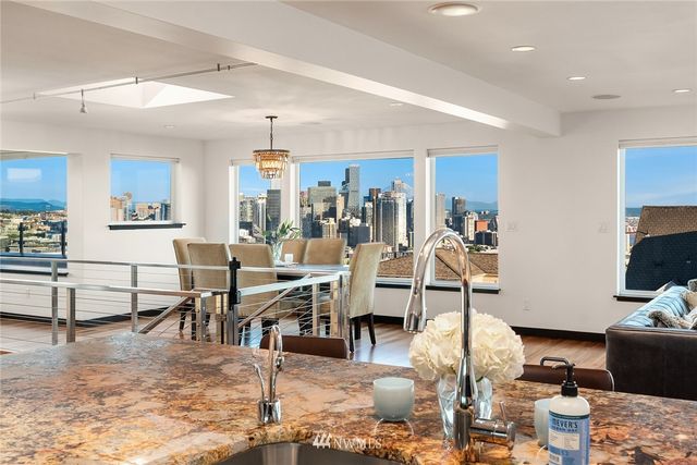 a living room with lots of furniture and appliances