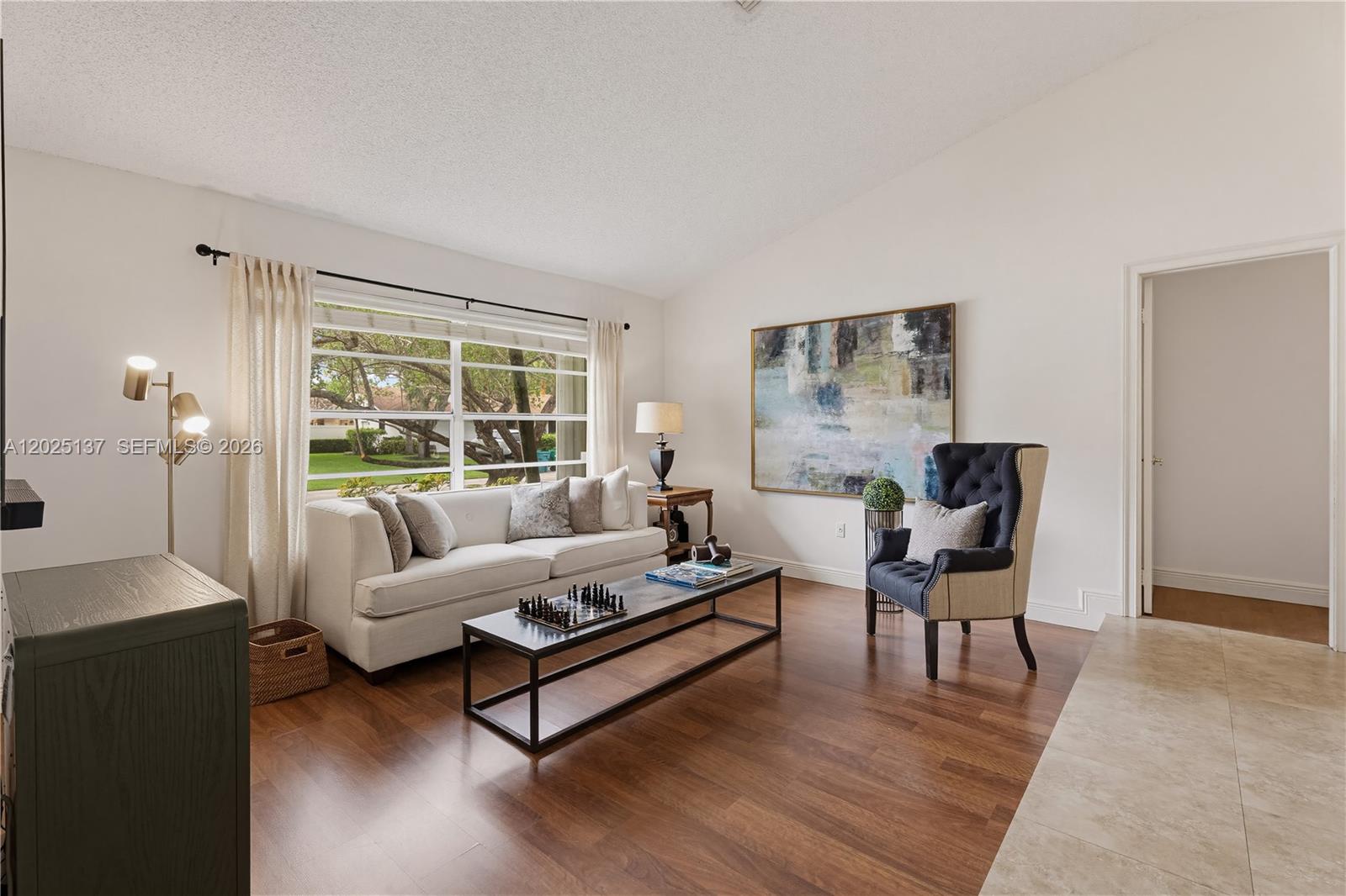 11480 Southwest 96th Terrace Miami, FL 33176 - Photo 5 of 54 a living room with furniture and a large window