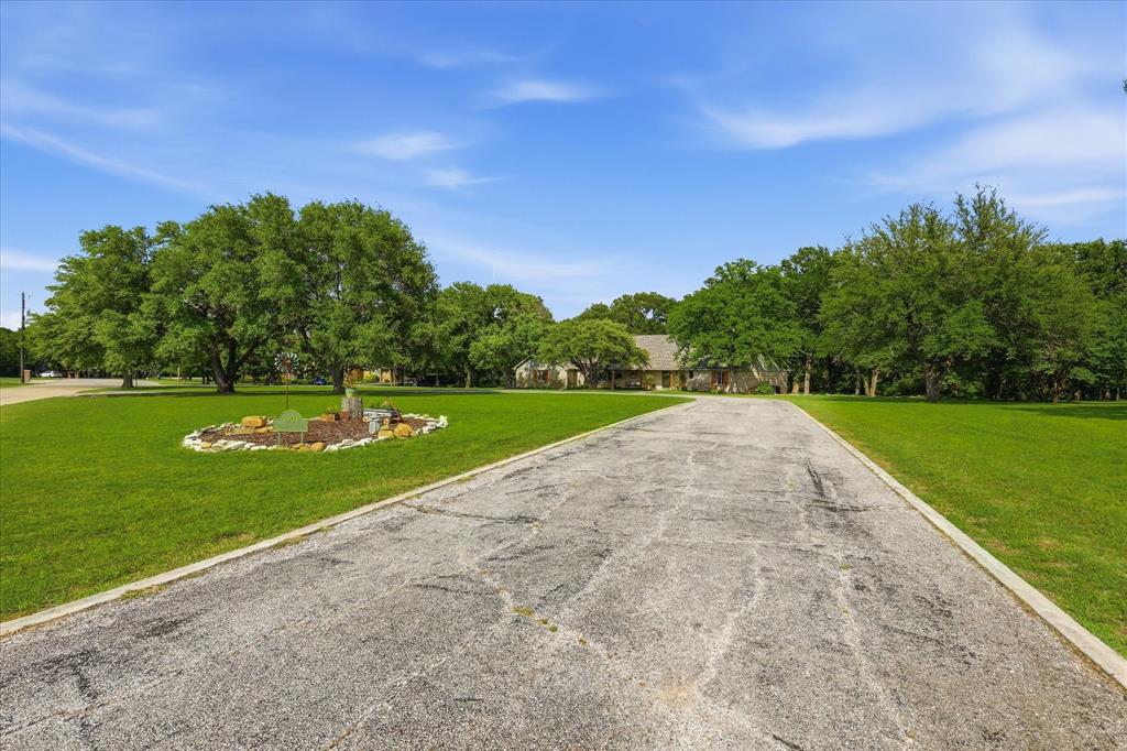 1904 Oak Ridge Trail Bridgeport, TX 76426 - Photo 2 of 40 a view of a park with large trees