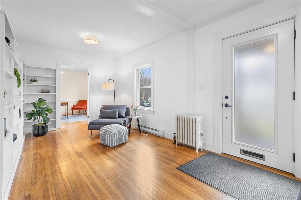 34 Fletcher Road Bedford, MA 01730 - Photo 14 of 42 a living room with furniture and wooden floor