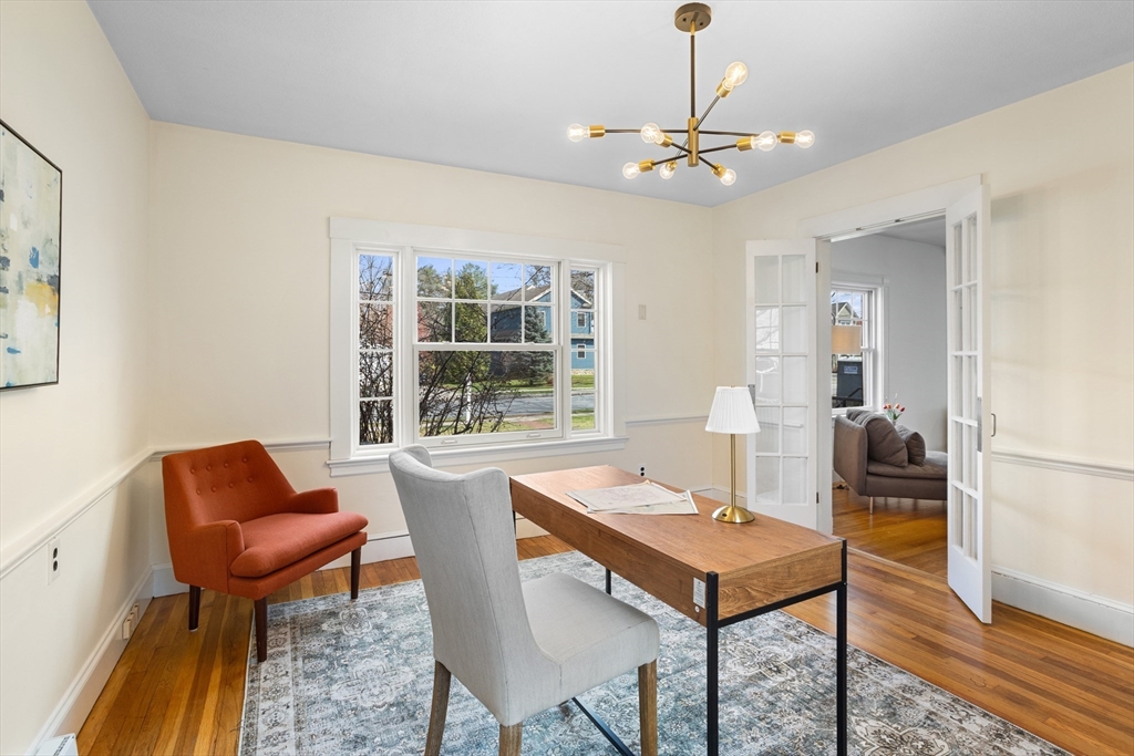 34 Fletcher Road Bedford, MA 01730 - Photo 19 of 42 a dining room with a table and chairs