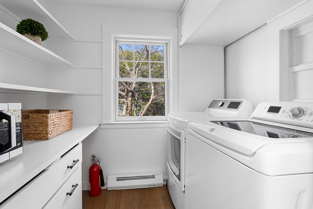 34 Fletcher Road Bedford, MA 01730 - Photo 24 of 42 a utility room with dryer and washer