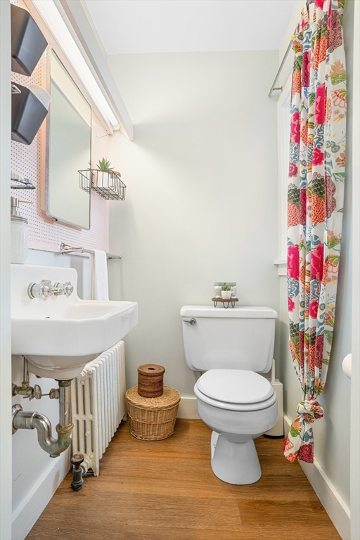 34 Fletcher Road Bedford, MA 01730 - Photo 28 of 42 a bathroom with a toilet and a sink