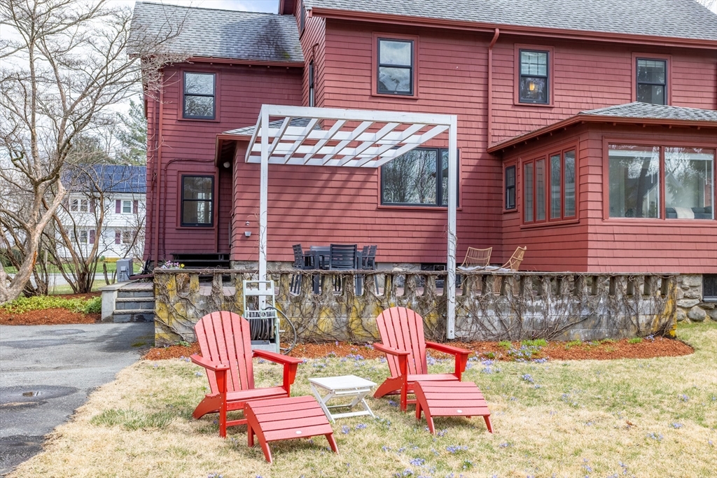 34 Fletcher Road Bedford, MA 01730 - Photo 32 of 42 a front view of a house with a patio