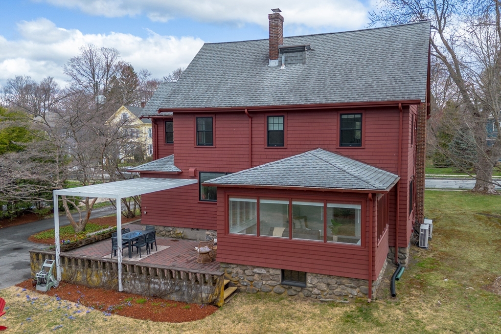 34 Fletcher Road Bedford, MA 01730 - Photo 33 of 42 a front view of a house with garden