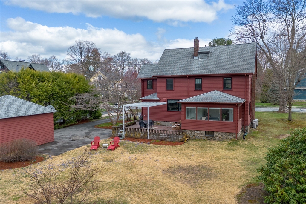 34 Fletcher Road Bedford, MA 01730 - Photo 35 of 42 a view of a house with a yard