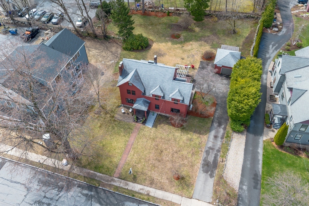 34 Fletcher Road Bedford, MA 01730 - Photo 39 of 42 an aerial view of a house with a yard basket ball court and outdoor seating