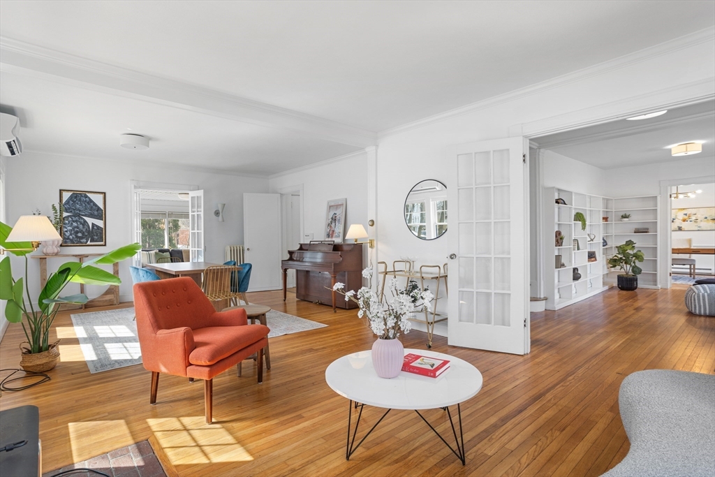 34 Fletcher Road Bedford, MA 01730 - Photo 4 of 42 a living room with furniture and wooden floor