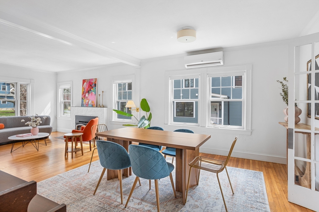 34 Fletcher Road Bedford, MA 01730 - Photo 7 of 42 a view of a dining room with furniture and wooden floor