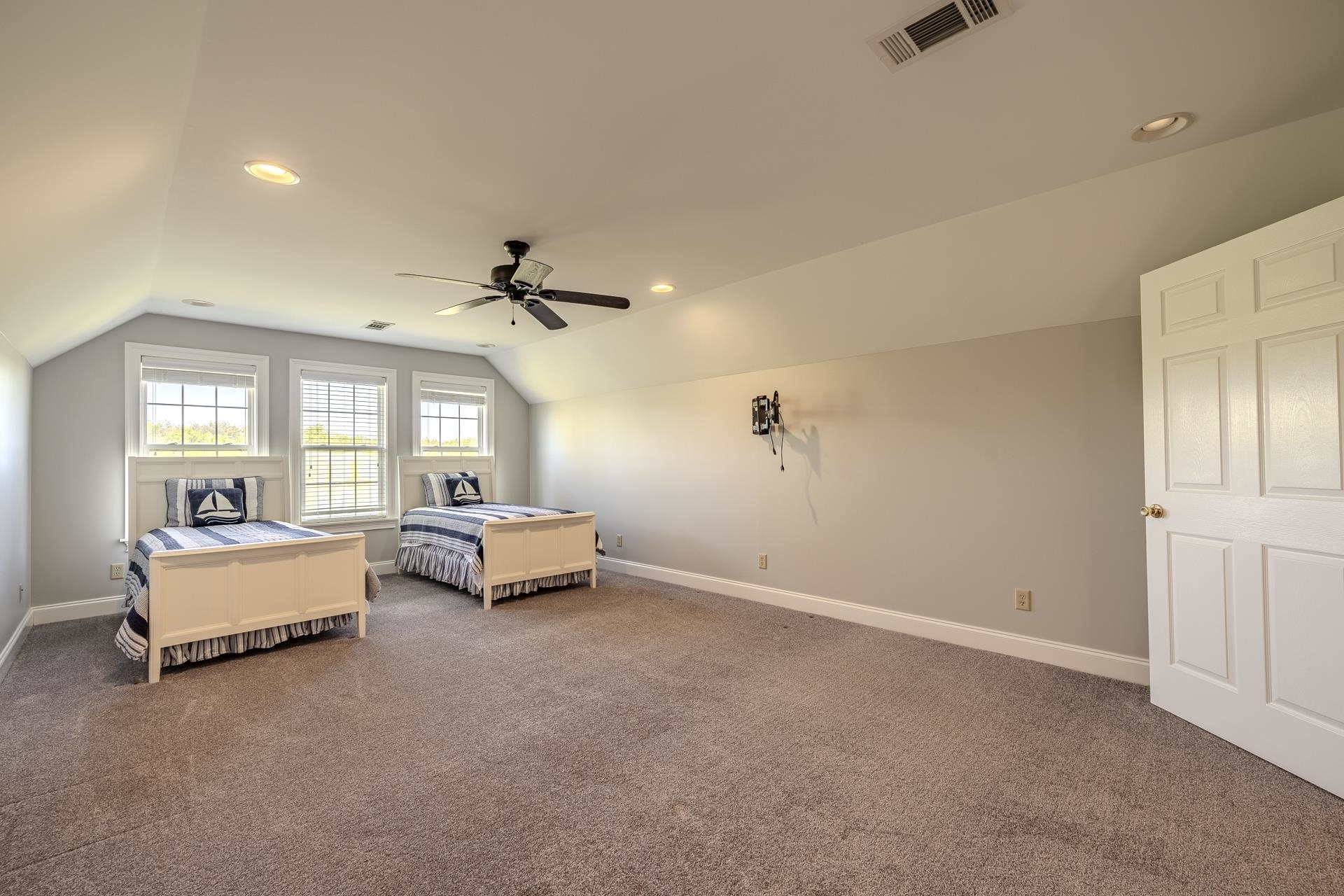 9 Mountain View Iuka, MS 38852 - Photo 22 of 32 Bedroom featuring vaulted ceiling, recessed lighting, carpet floors, and a ceiling fan