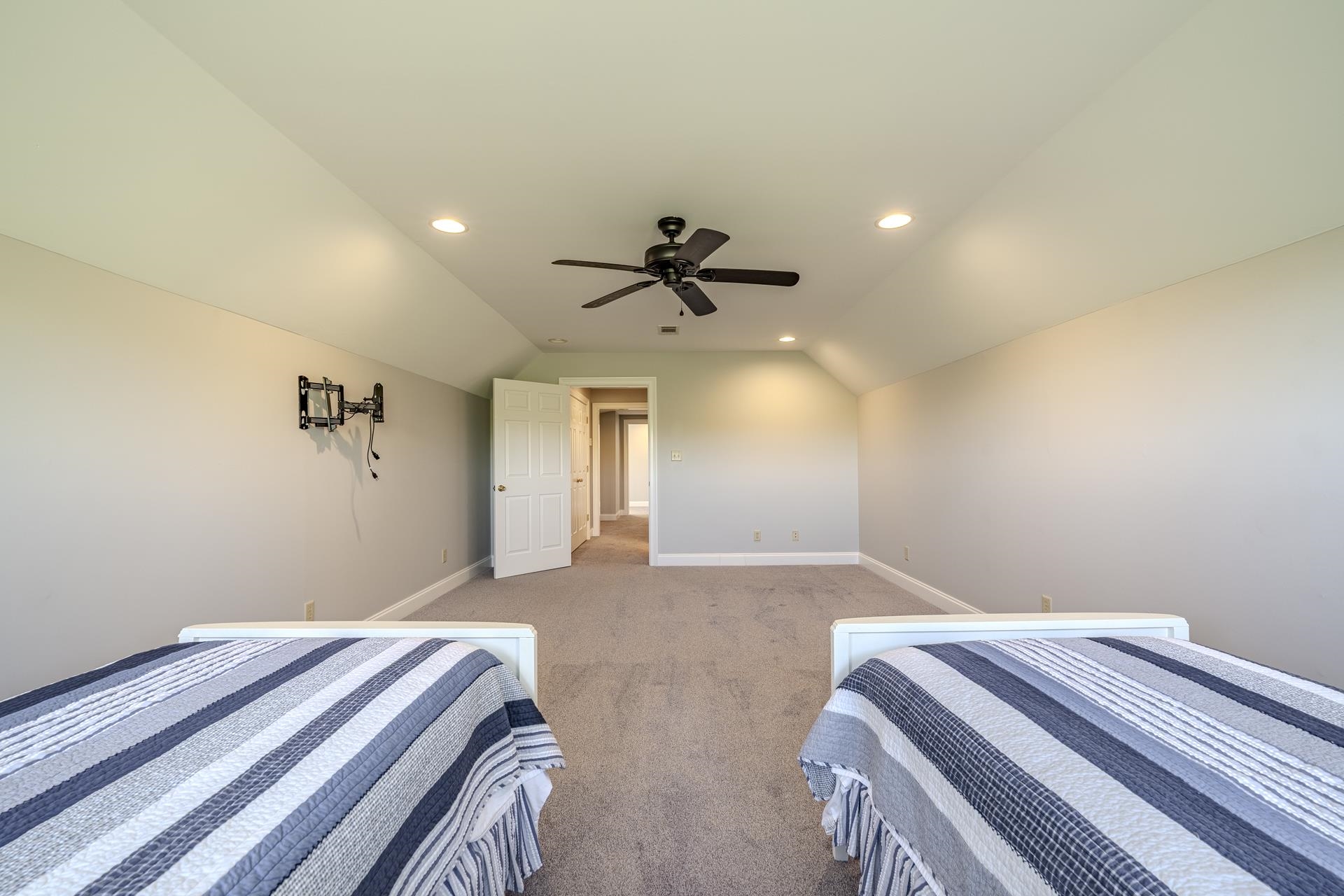 9 Mountain View Iuka, MS 38852 - Photo 23 of 32 Bedroom with light carpet, recessed lighting, ceiling fan, and lofted ceiling
