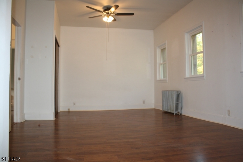 245 Millbrook Road Washington, NJ 07882 - Photo 19 of 34 a view of a room with wooden floor and cabinet