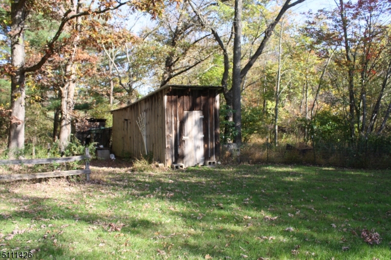 245 Millbrook Road Washington, NJ 07882 - Photo 29 of 34 a backyard of a house with lots of green space