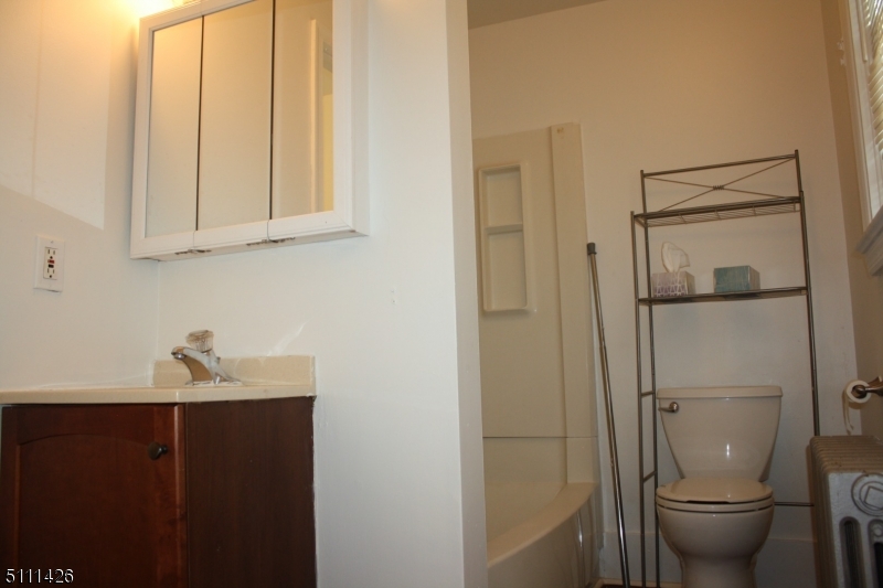 245 Millbrook Road Washington, NJ 07882 - Photo 10 of 34 a bathroom with a sink toilet and shower