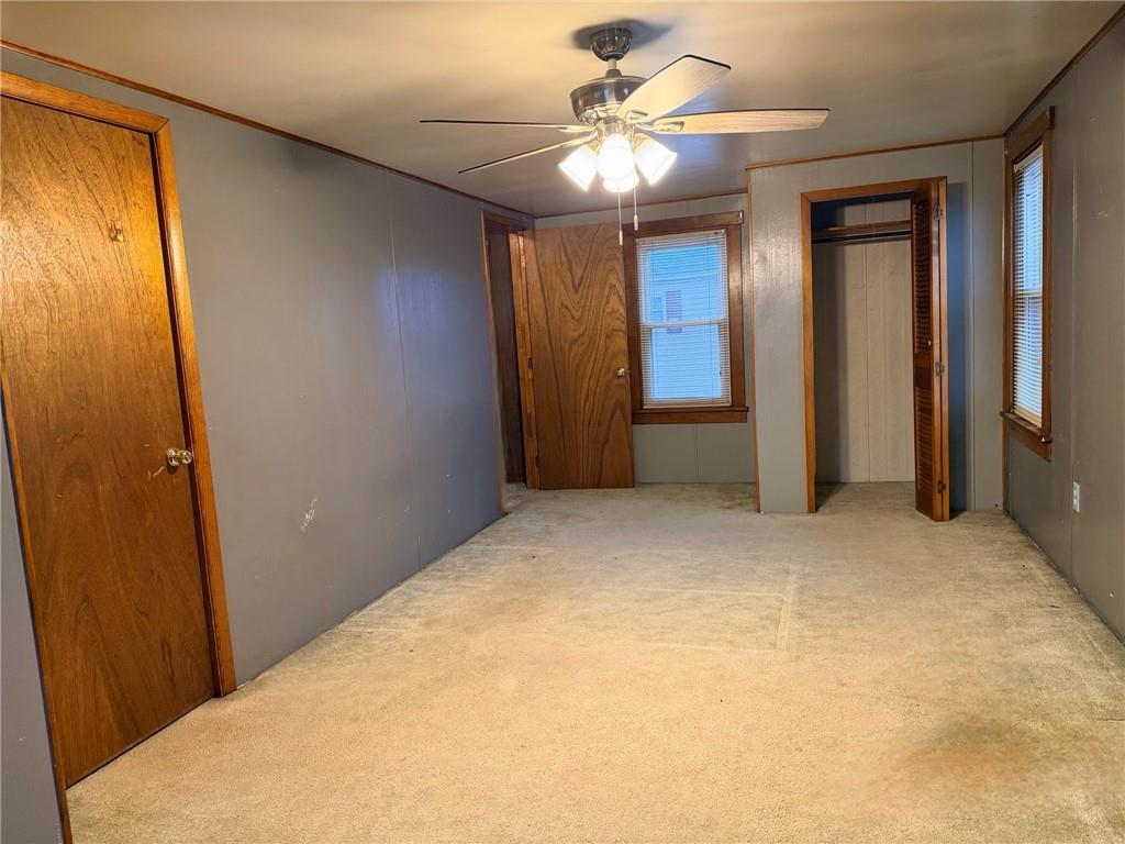 1408 State Rte 1042 Nu Mine, PA 16244 - Photo 13 of 19 wooden floor in an empty room with a bathroom