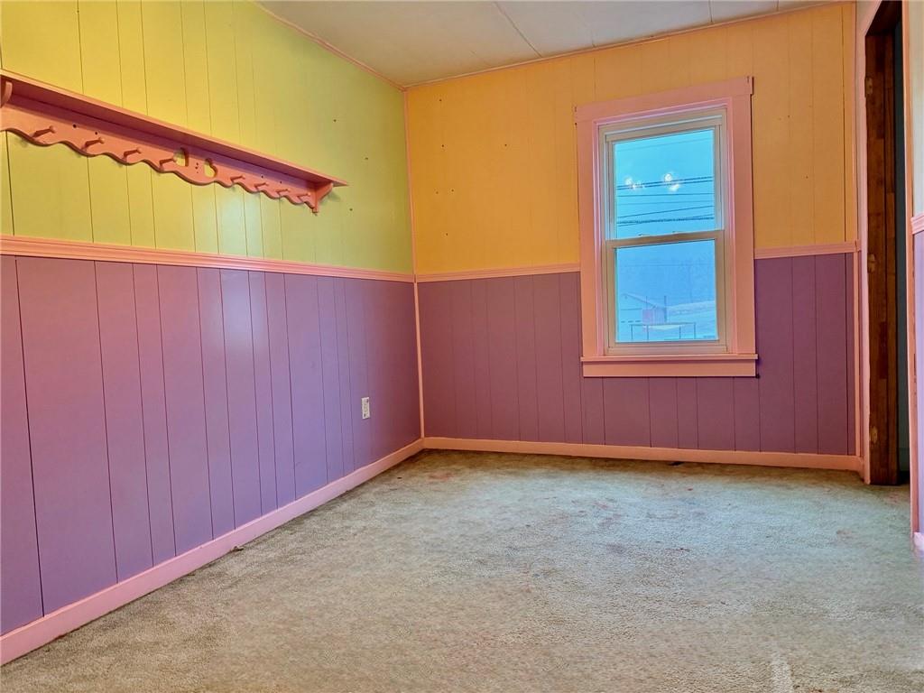 1408 State Rte 1042 Nu Mine, PA 16244 - Photo 14 of 19 an empty room with windows and closet