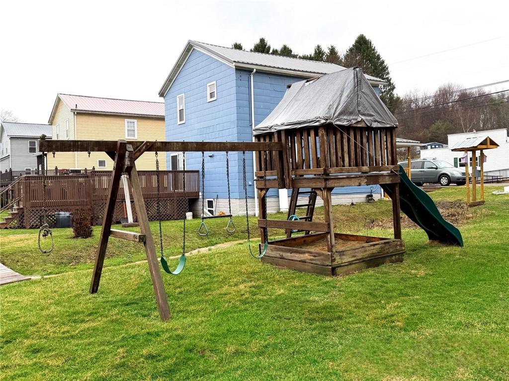 1408 State Rte 1042 Nu Mine, PA 16244 - Photo 8 of 19 a view of playground with a slide and swing