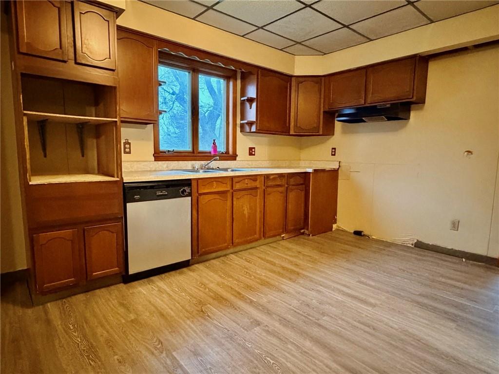 1408 State Rte 1042 Nu Mine, PA 16244 - Photo 10 of 19 a kitchen with stainless steel appliances granite countertop a sink and cabinets
