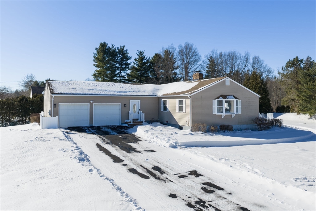 315 East Street South Suffield, CT 06078 - Photo 1 of 31 a view of house with wooden fence